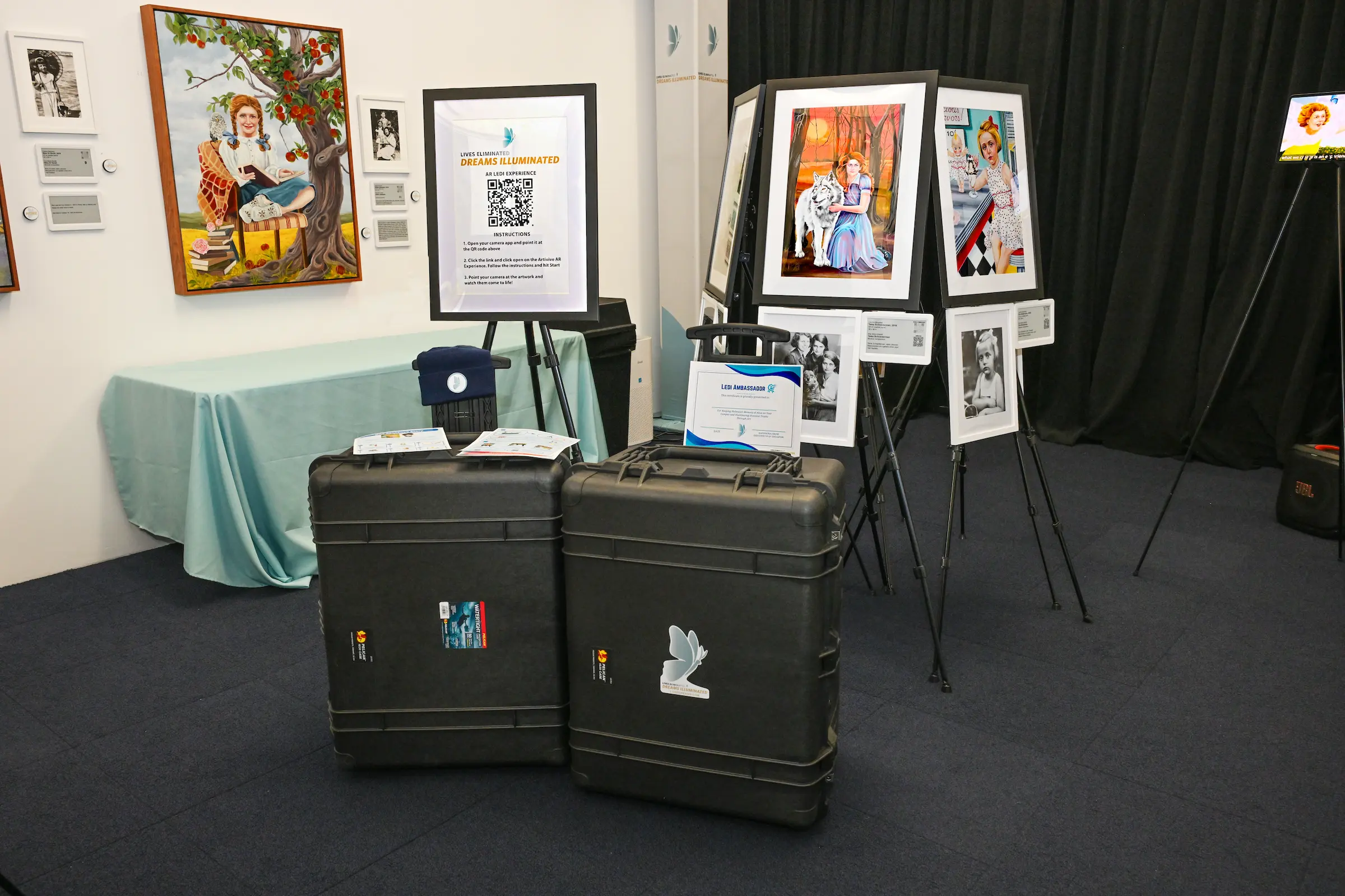 LEDI in a Box portable exhibition with artwork